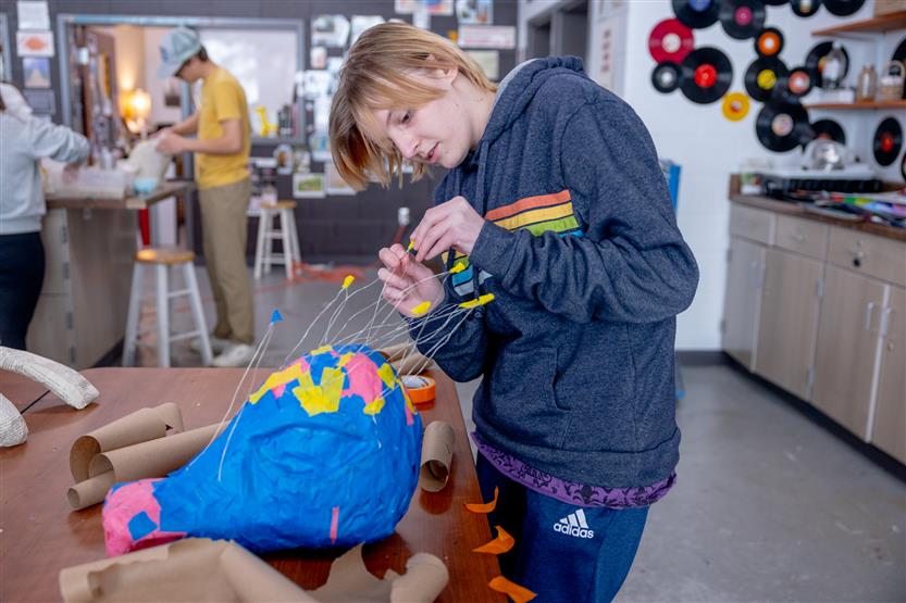 Students do papier-mache art